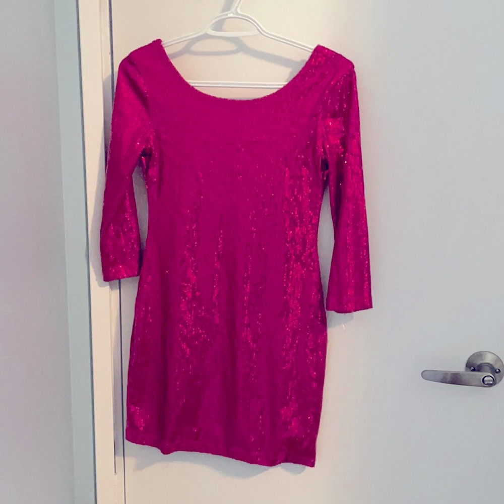Pink sequin dress from Seductions. Don’t wear enough.
